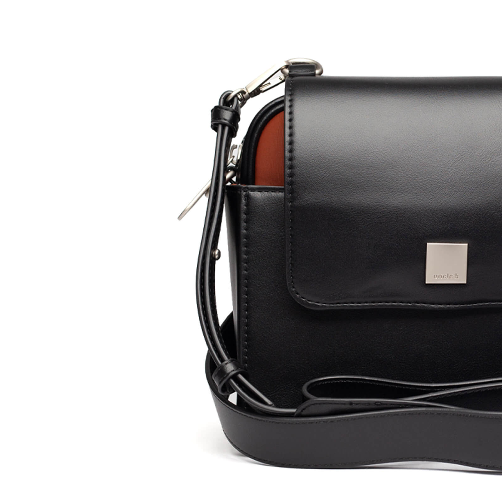 bolsa-tiracolo-media-pu-neoprene-61322-i25-unclek-preto-telha-8.jpg